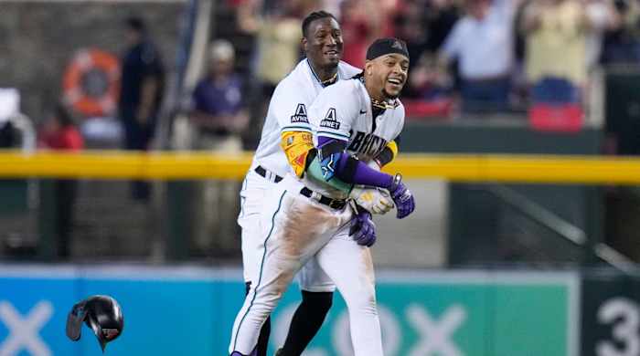 Diamondbacks’ Ketel Marte (4) celebrates his walk-off single with Geraldo Perdomo in Game 3 of the NLCS against the Phillies.